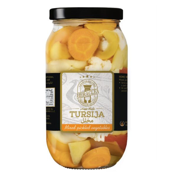 Jar of Heraclea Home Made Tursija with mixed pickled vegetables on a plain background.